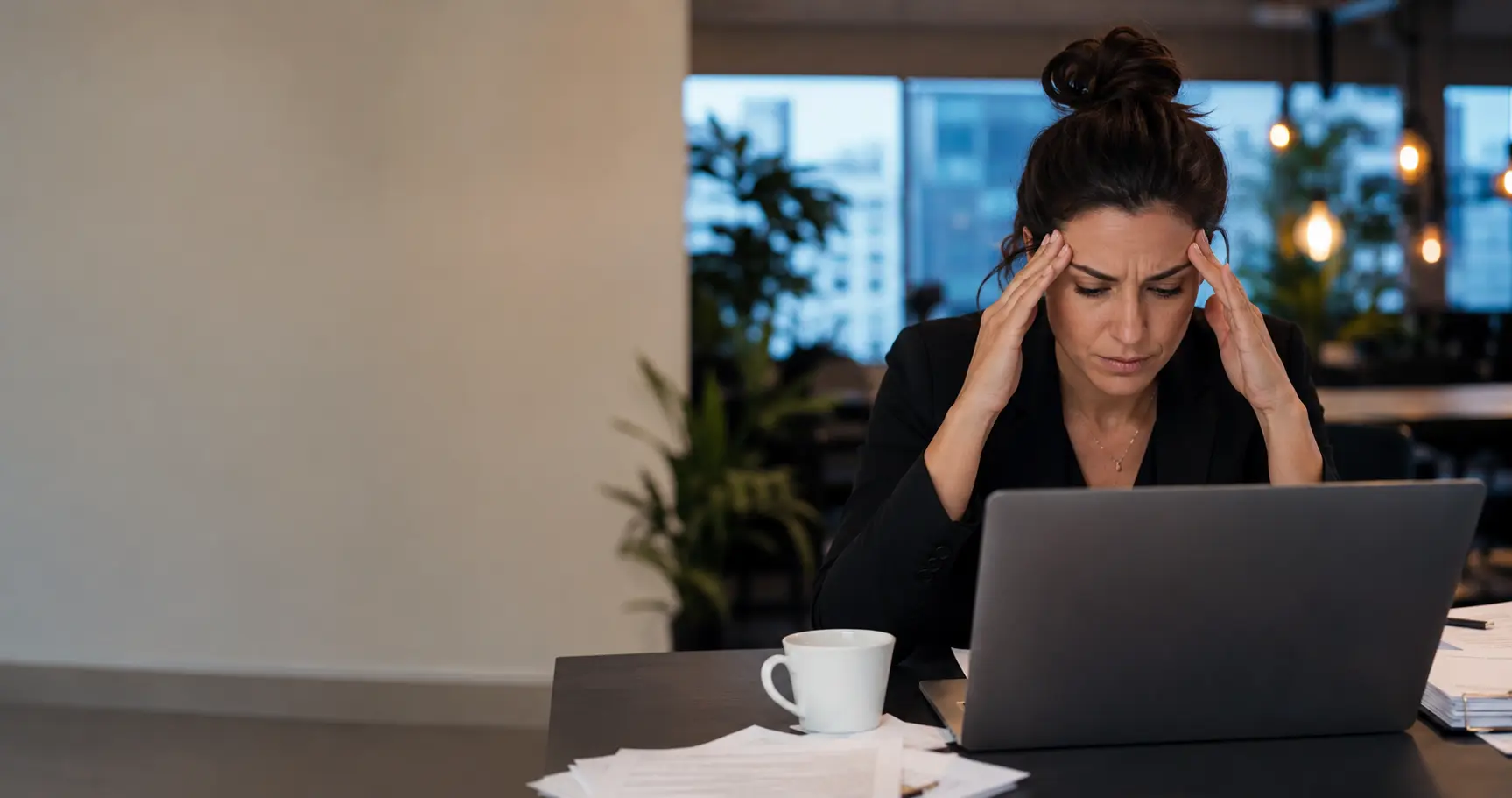 A small-business hiring manager overwhelmed by applicant volume